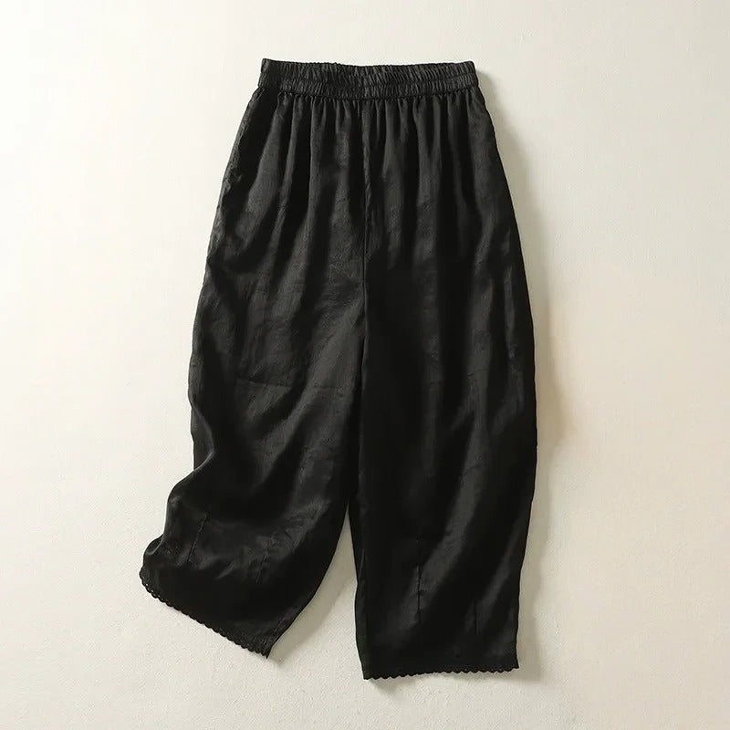 Women's cropped linen trousers relaxed fit mid-calf length with soft gathers and stretch waistband