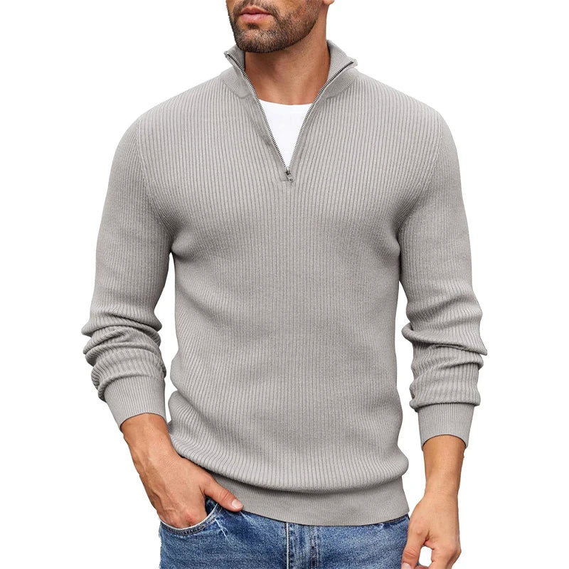 Men's slim fit ribbed knit half-zip sweater in warm neutral tones, structured vertical texture