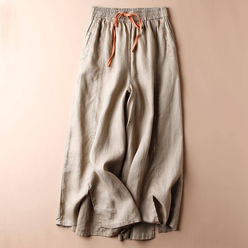 Women's natural linen relaxed-fit pants with hand-stitched embroidered pocket accents