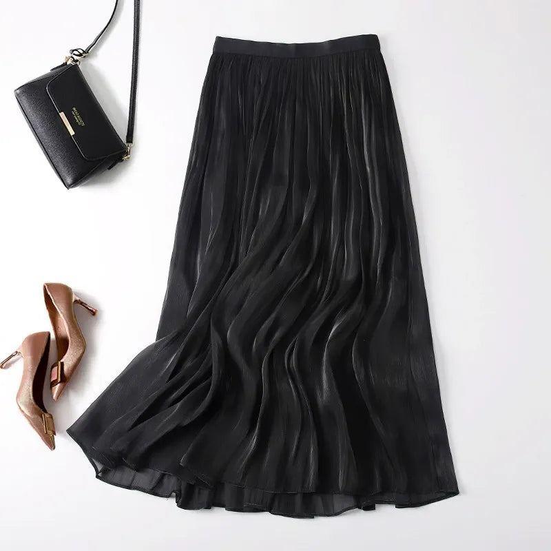 Women's beige linen-blend pleated midi skirt with soft elastic waistband and flowing silhouette