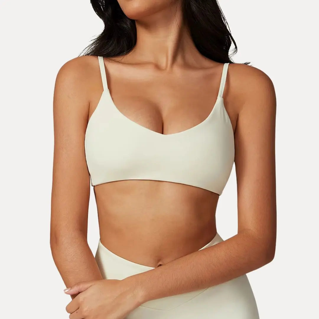 Luna strappy sports bra light medium support flexible straps minimalist silhouette for active women