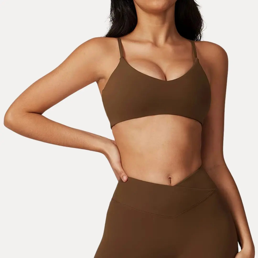 Luna strappy sports bra light medium support flexible straps minimalist silhouette for active women