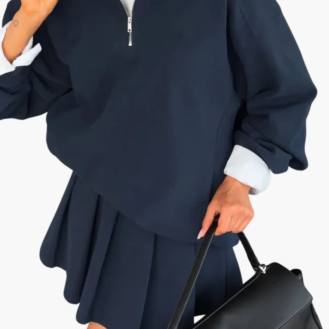 Women's long sleeve half-zip dress with pleated hem, shirt collar, sleek office-ready silhouette
