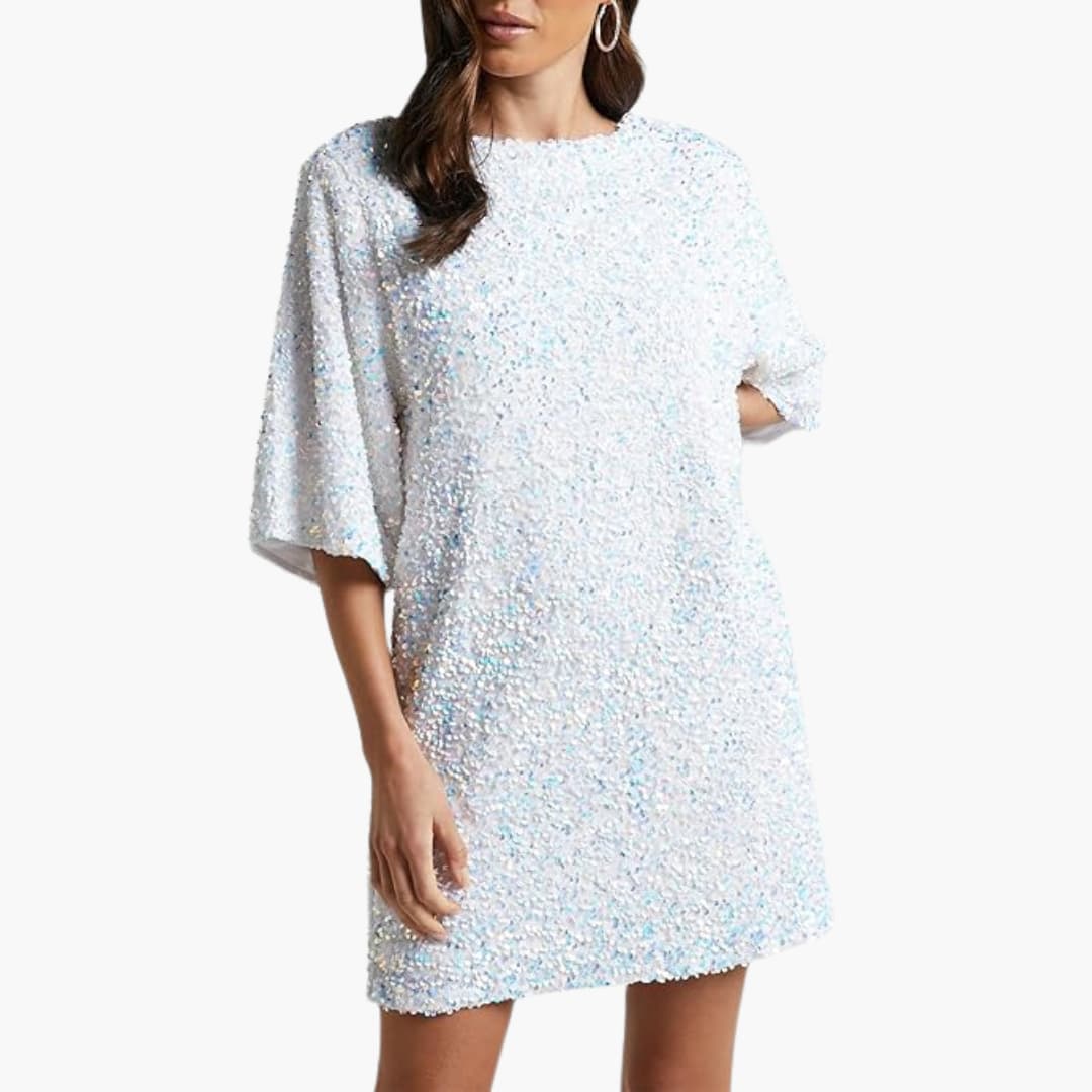 Women's silver allover sequin dress with round neckline, fitted waist, and long flared sleeves