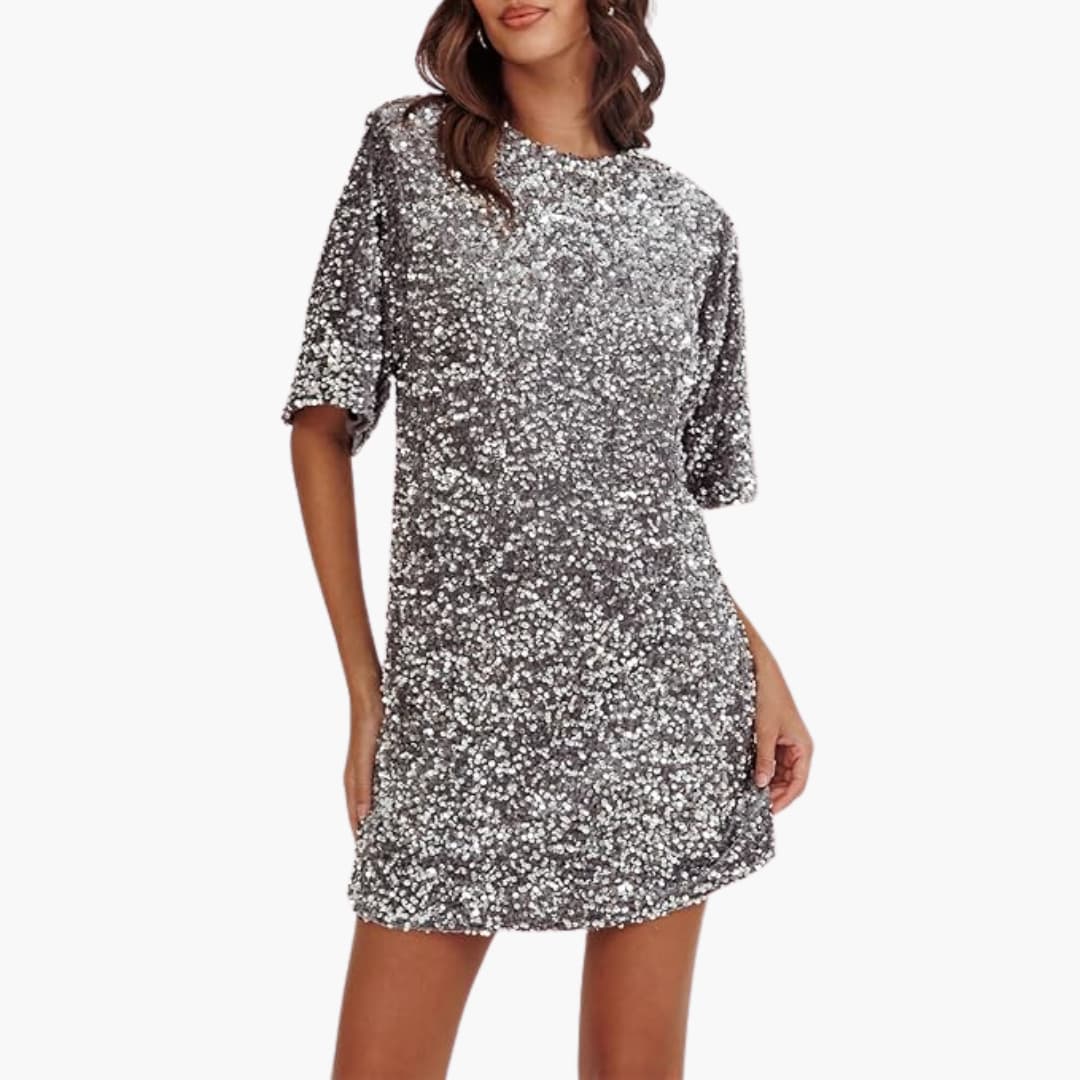 Women's silver allover sequin party dress with round neckline, fitted waist, and flared long sleeves