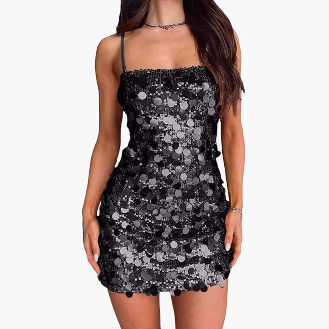 Women's silver sequin spiral mini dress with thin straps, fitted bodice, and short skirt for party