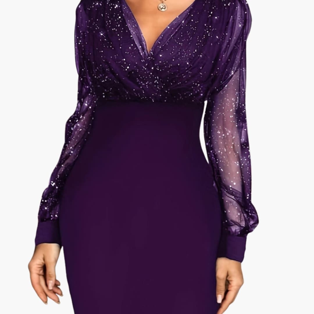 Women's silver sequin cocktail dress with sheer sleeves, V-neckline, and tailored fit for festive occasions