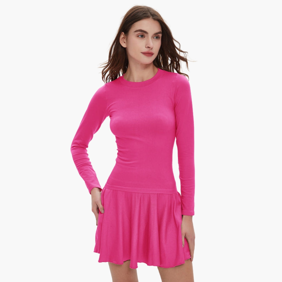 Women's long sleeve round neck dress with fitted waist, fluid draped skirt, and side pockets