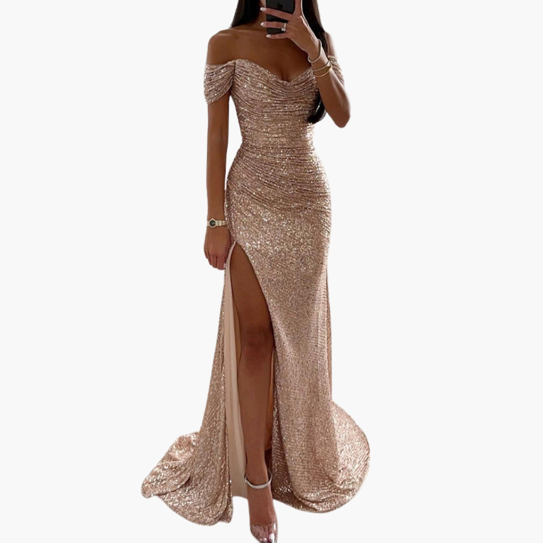 Women's silver sequin off-shoulder long dress with draped sleeves, side slit, and full glitter surface