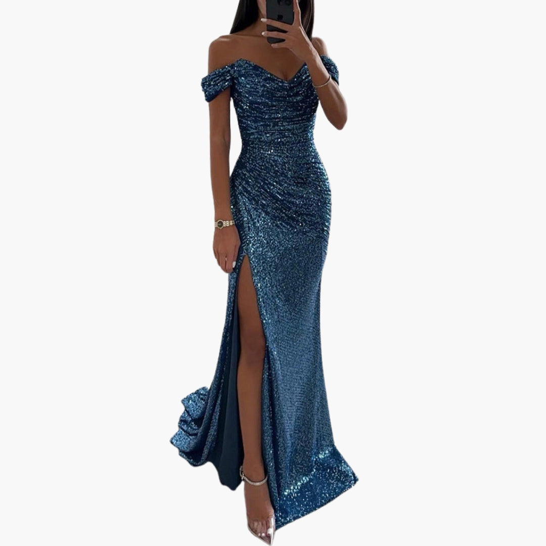 Women's silver sequin off-shoulder long dress with draped sleeves, side slit, and full glitter surface