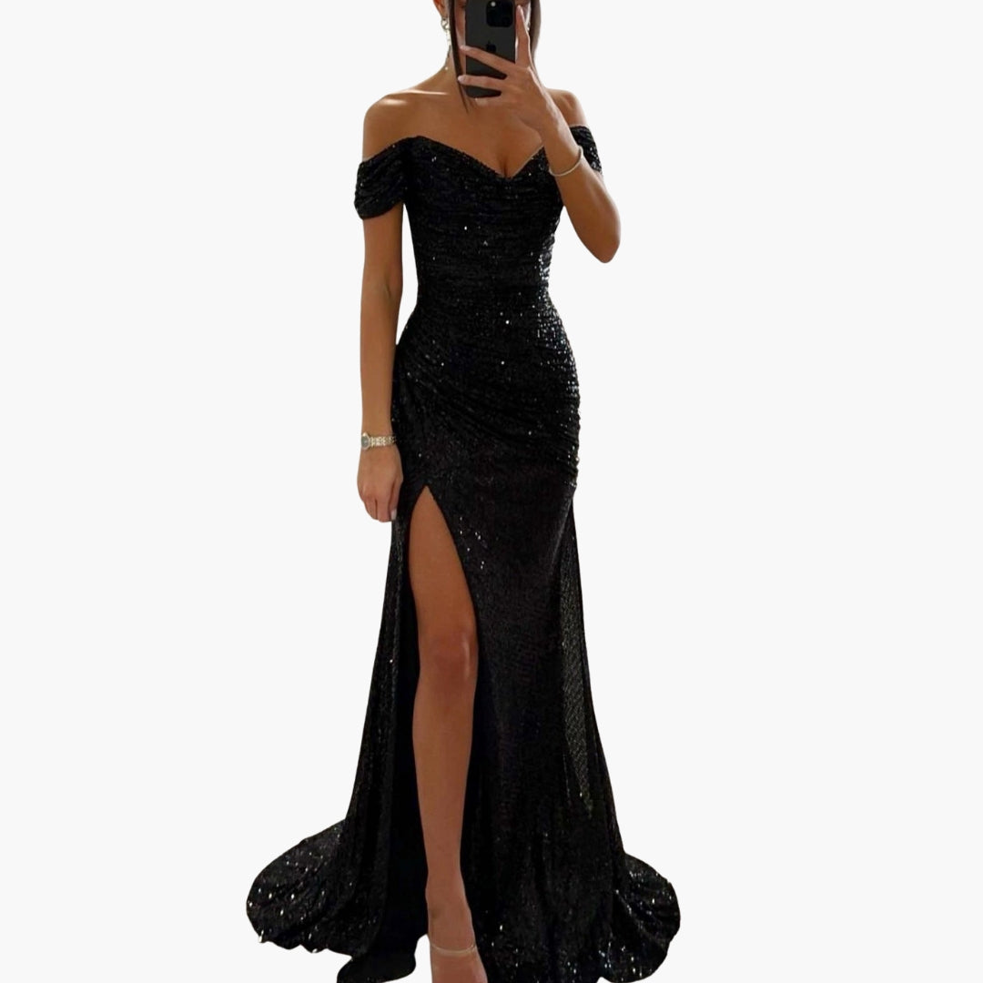Women's silver sequin off-shoulder long dress with draped sleeves, side slit, and full glitter surface