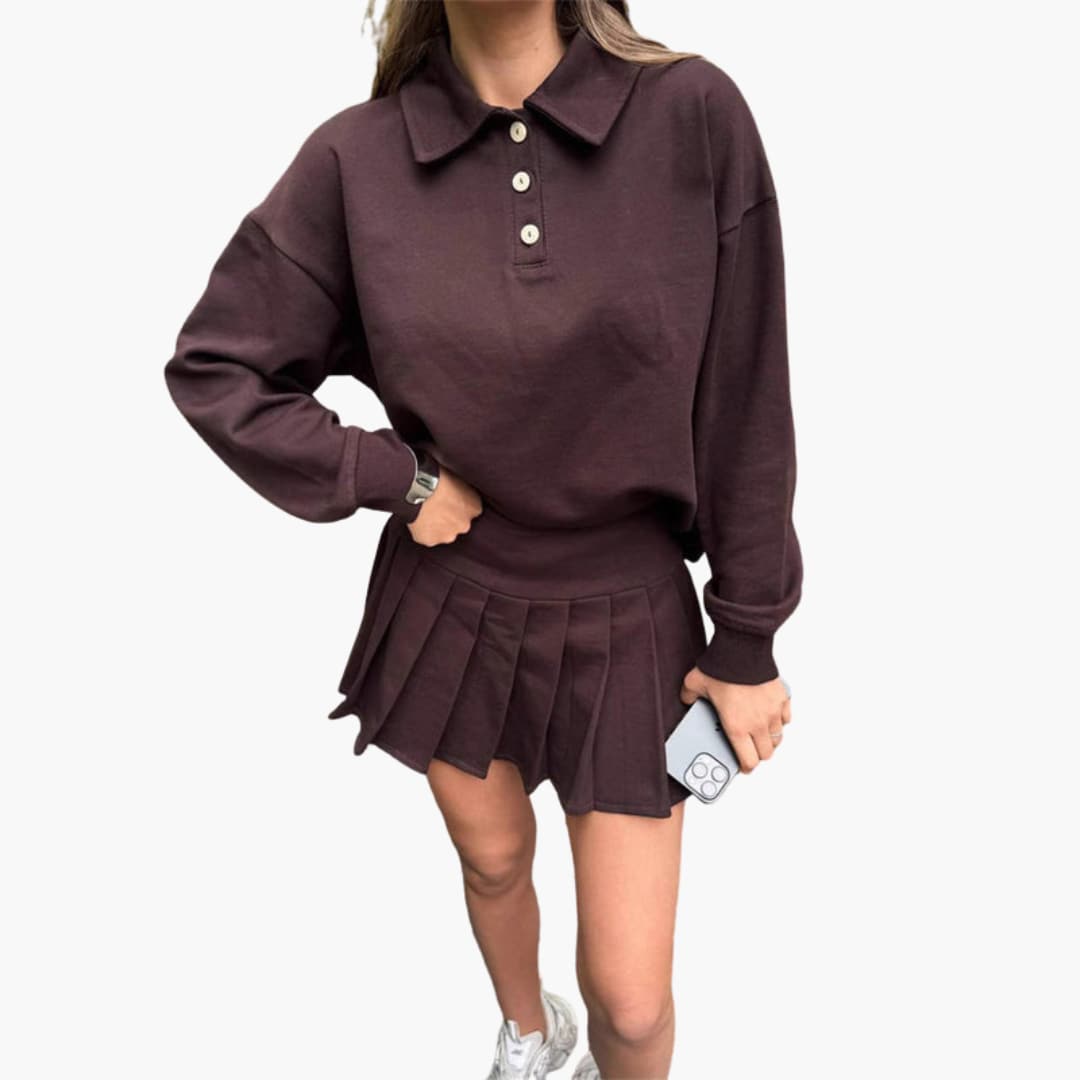 Women's polo dress with buttoned collar and pleated skirt, sporty-chic style for versatile wear