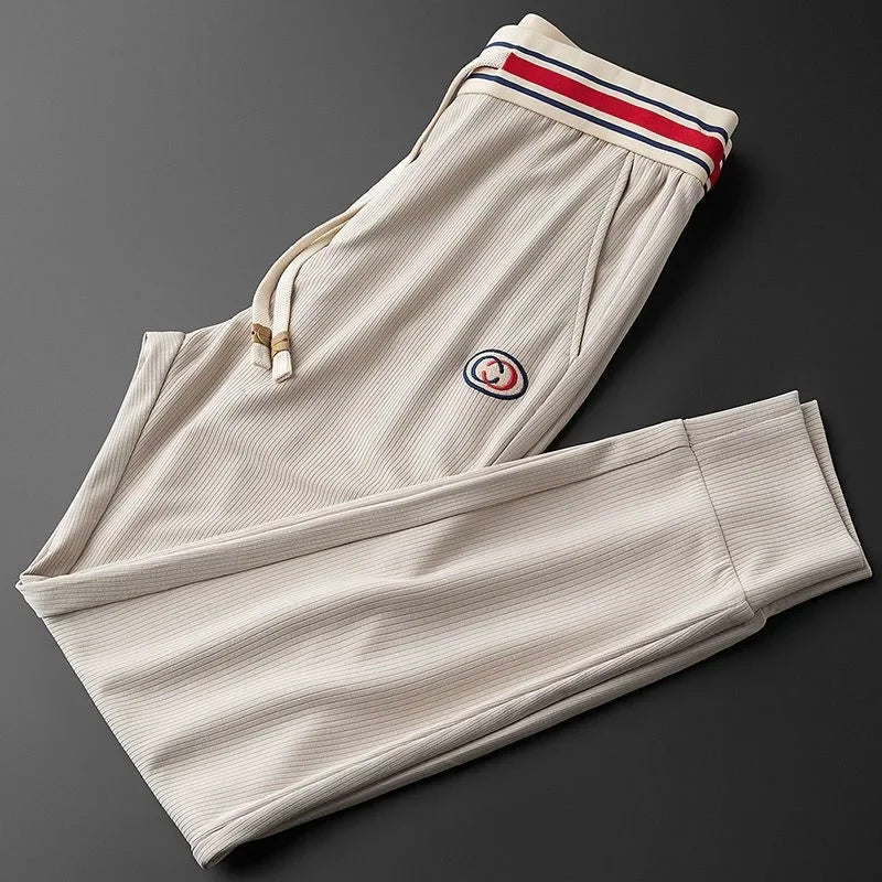 Roberto Russo black slim-fit active pants premium polyester spandex blend with ribbed ankles