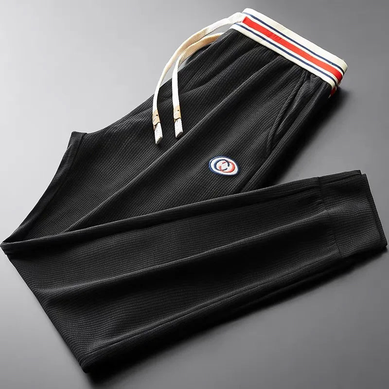 Roberto Russo black slim jogger pants ribbed ankles drawstring waist premium polyester spandex blend