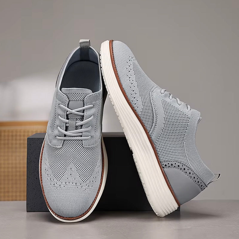 Men's gray knit mesh leisure sneakers with brogue-inspired perforations for breathable everyday comfort