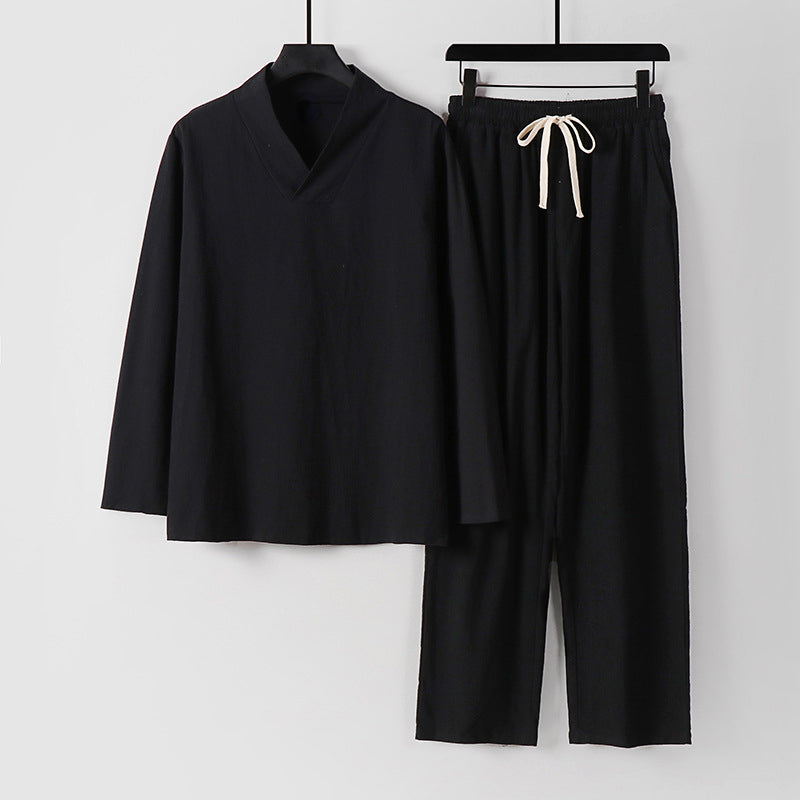 Men's two-piece loungewear set with V-neck long-sleeve top and matching drawstring pants minimalist style