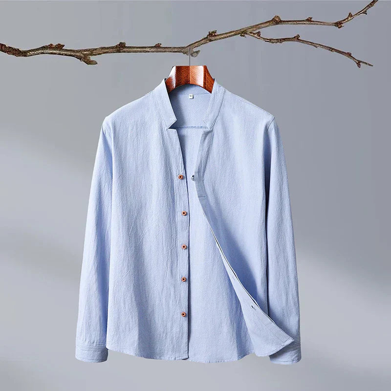 White Japanese-style long sleeve minimalist shirt with clean structure and luxurious poly-blend drape