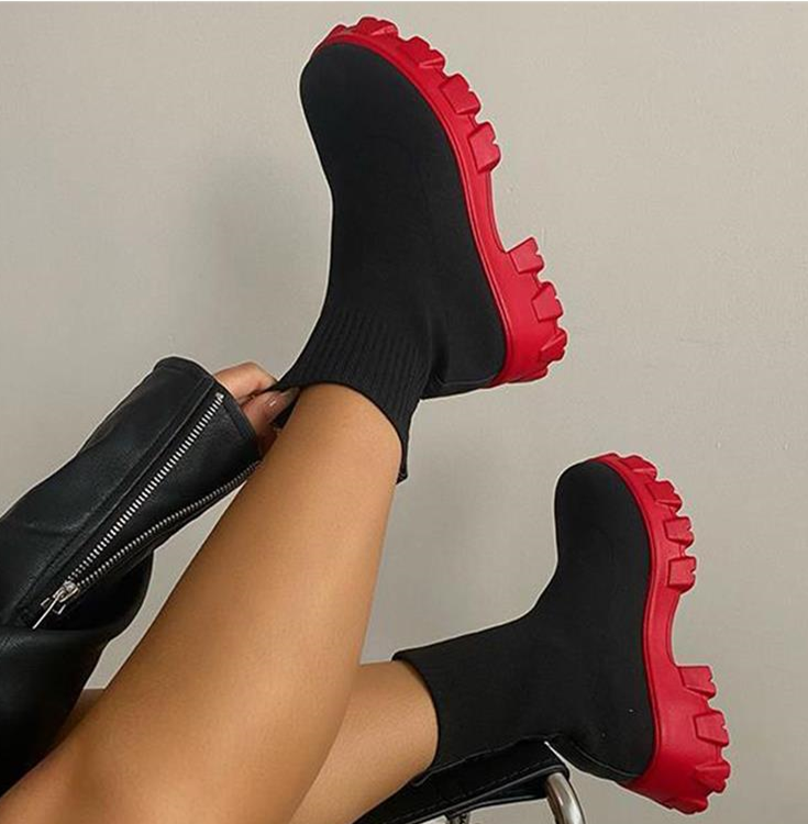 Women's slip-on chunky heel boots with stretch upper and lug sole for bold casual city style