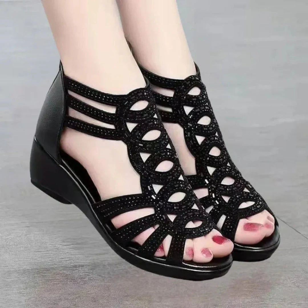 Rose cutout ankle strap wedge sandal with rhinestone embellishment and cushioned sole for parties