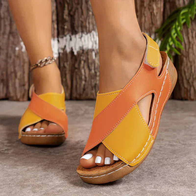 Women's beige orthopedic open-toe slingback sandals with contoured footbed and two-tone adjustable straps