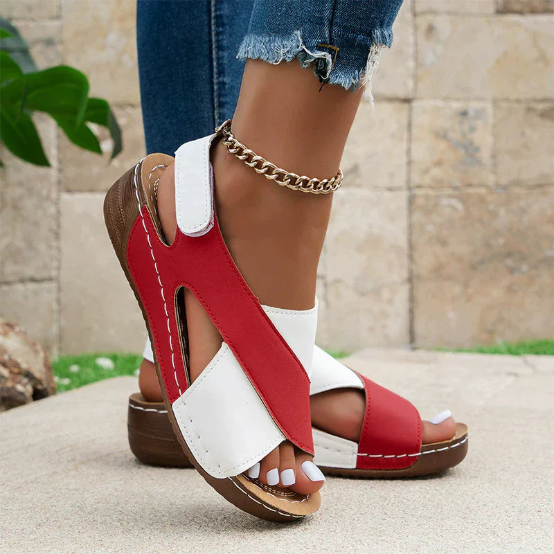Women's beige orthopedic open-toe slingback sandals with contoured footbed and two-tone adjustable straps