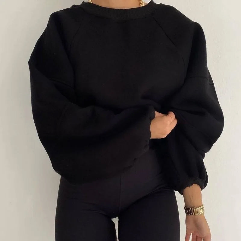 Women's oversized pullover sweatshirt cozy plush fabric relaxed fit for warm winter everyday wear