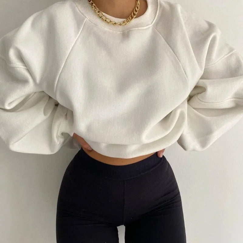Women's oversized pullover sweatshirt cozy plush fabric relaxed fit for winter everyday wear