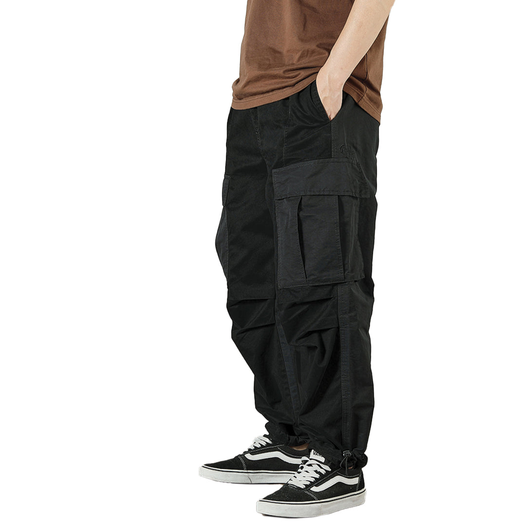 Stone cargo trousers loose straight-leg color-block panels multi-pocket utility streetwear comfort