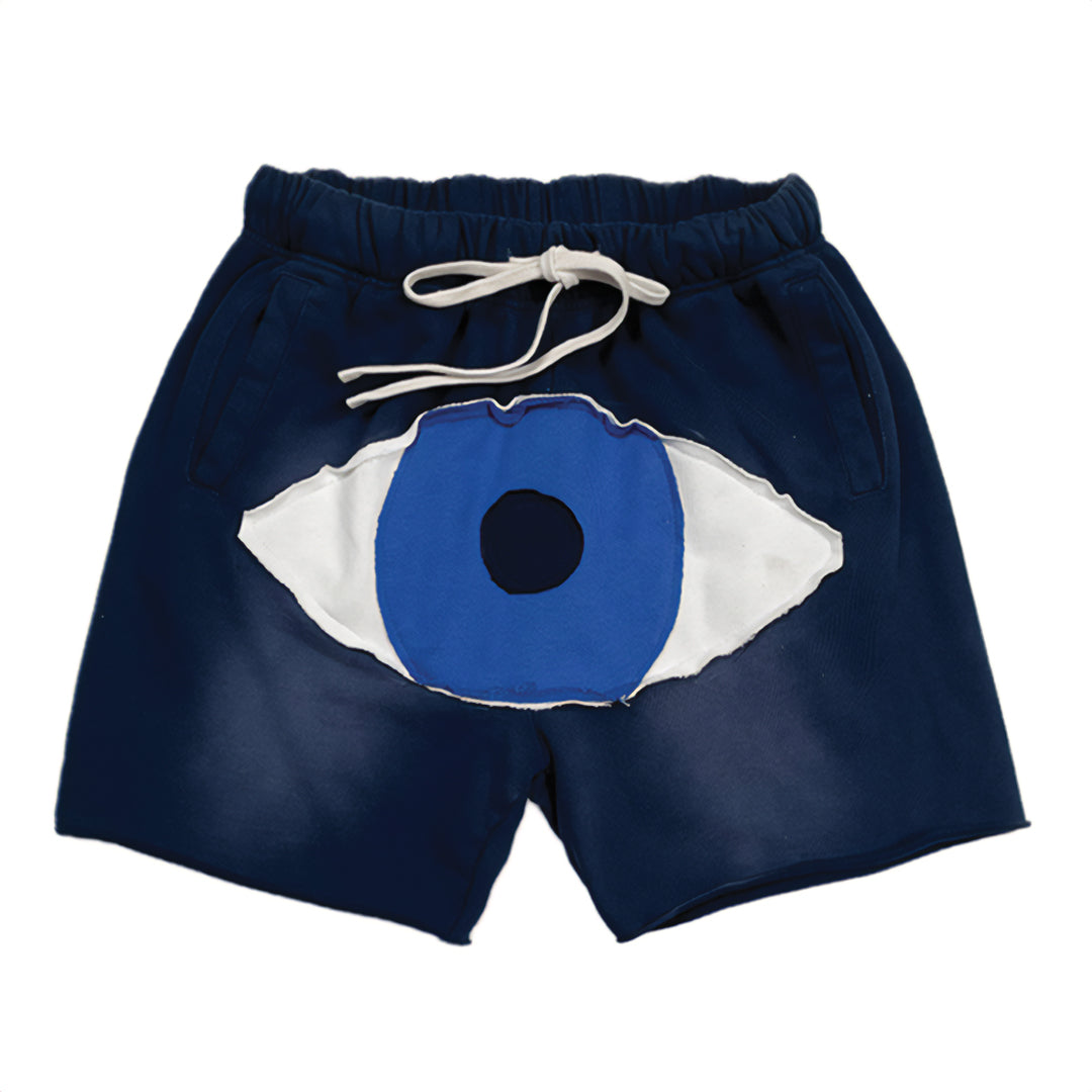 Unisex relaxed-fit faded cotton lounge shorts with bold patchwork third eye graphic patch design