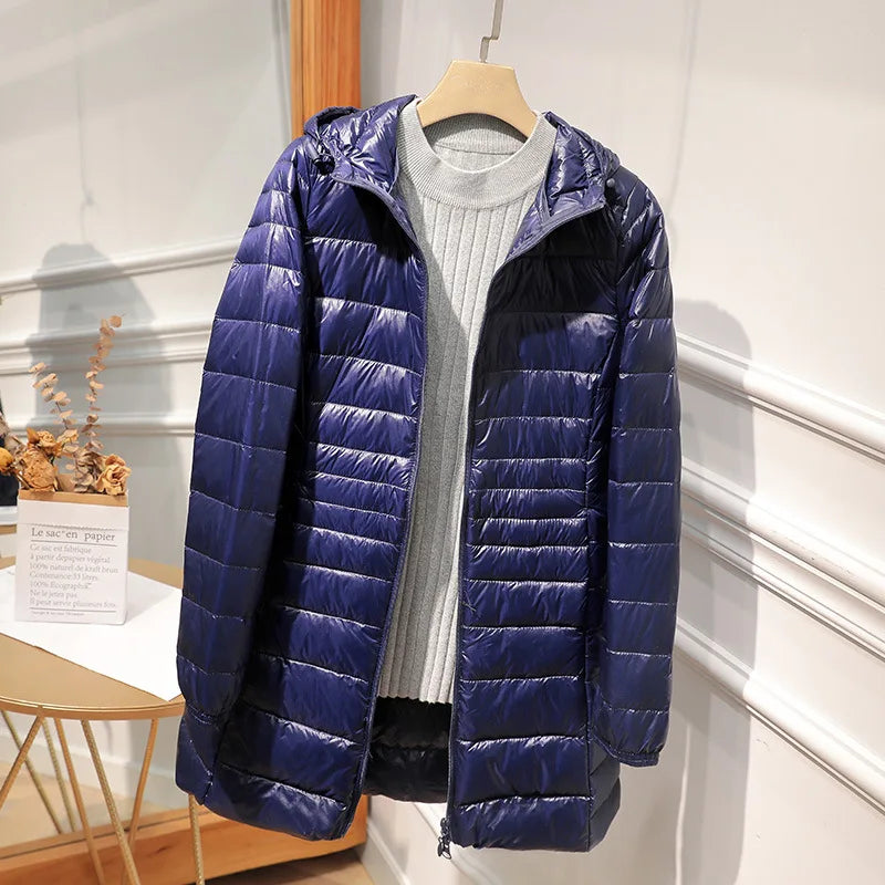 Women's long puffer jacket with hood, regular fit, elongated silhouette for cold-weather warmth