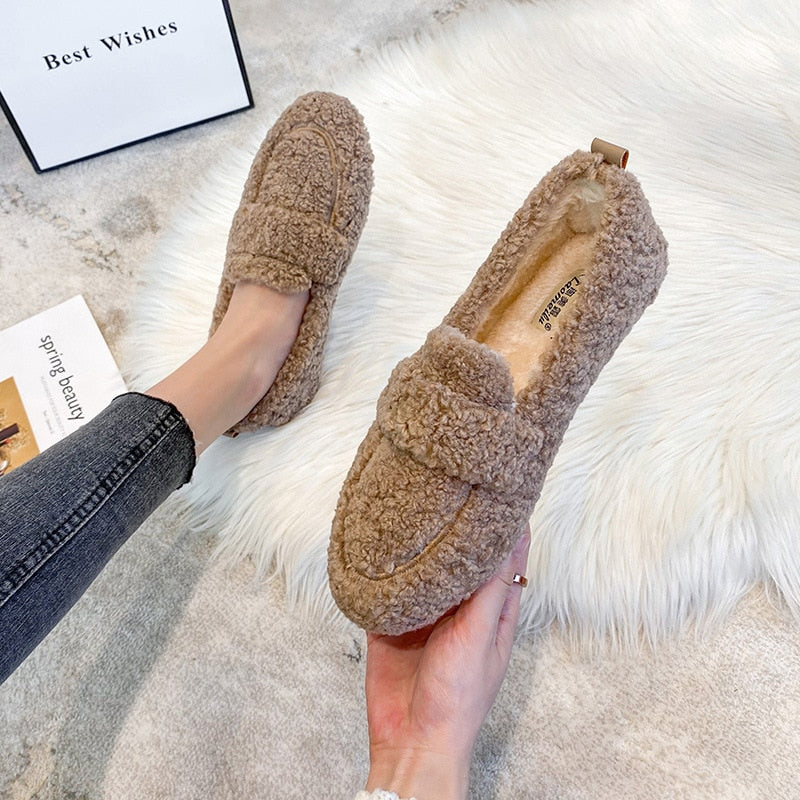 Women's plush moccasin slippers cozy cloudlike lining non-slip sole luxurious home comfort footwear