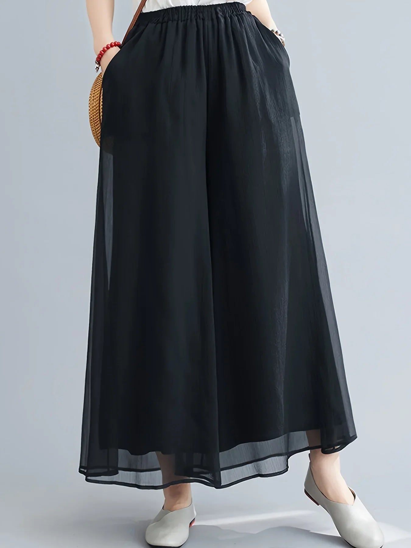 Women's sheer mesh chiffon flare pants with double-layer design and delicate sheer hem overlay