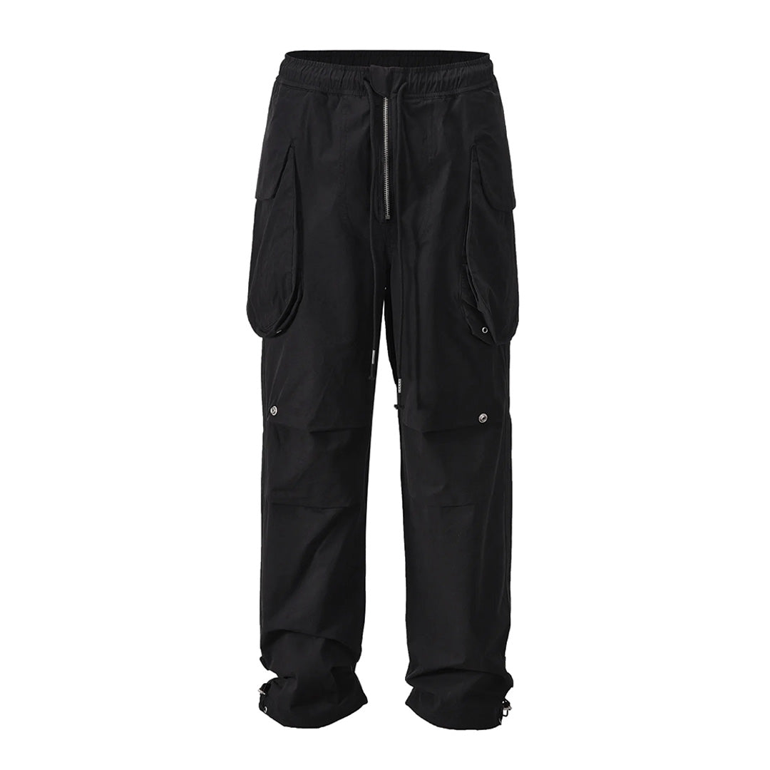 Rugged weatherproof cargo pants with riveted deep pockets, articulated knees, and adjustable drawstrings