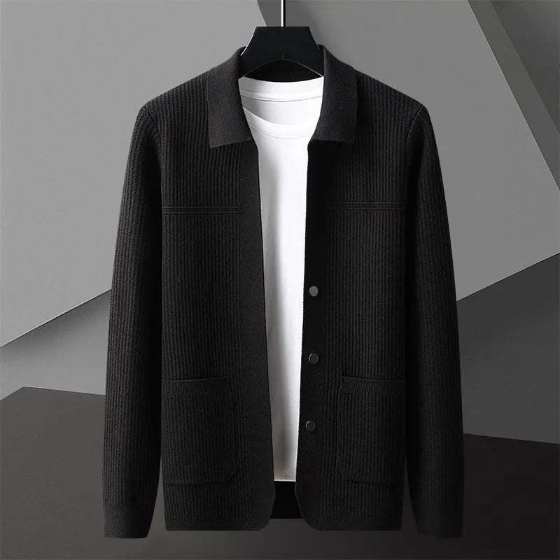 Men's lightweight knit cardigan with sharp lapel, deep pockets, and structured smart-casual silhouette
