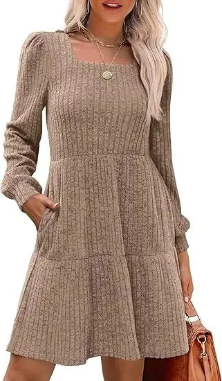 Elegant white mini dress with empire waist, square neckline, and doll pockets for women