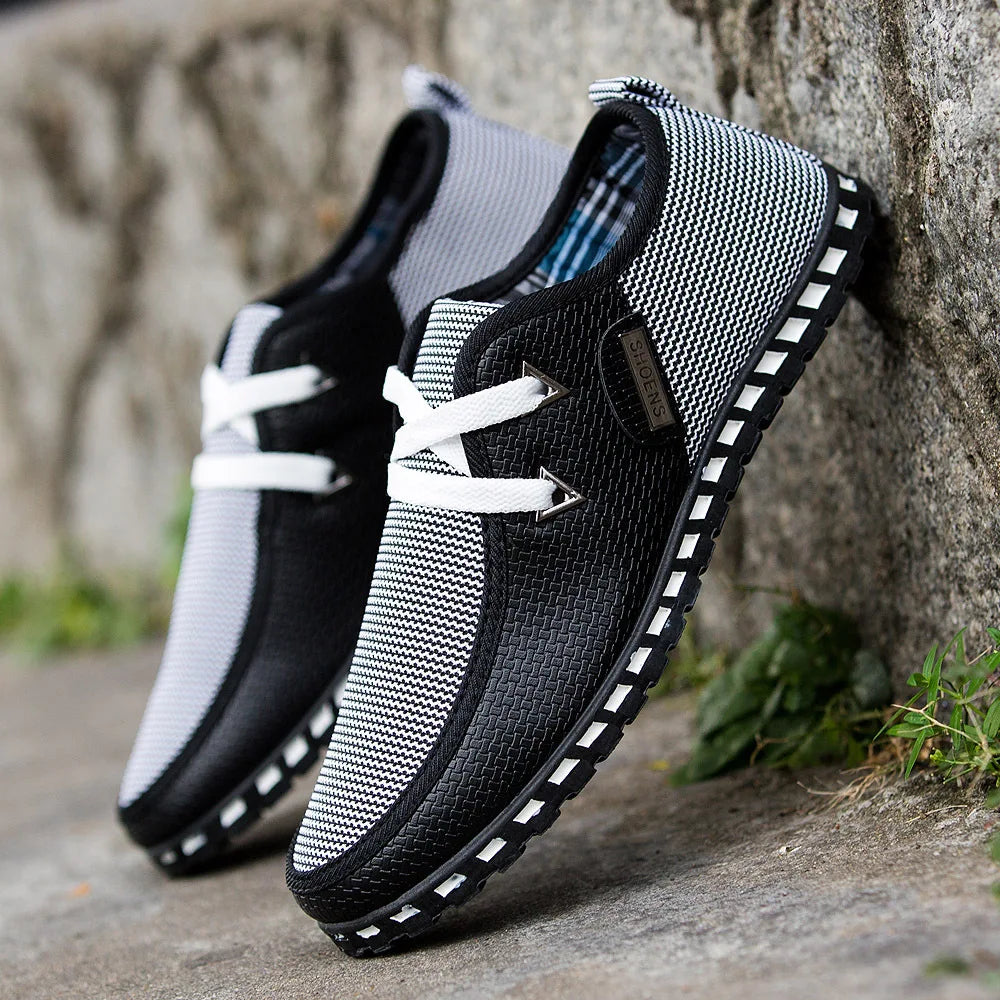White leather sneakers with ventilated woven upper, orthopedic arch support, and casual everyday style