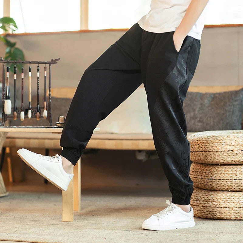 Black cotton-linen harem pants relaxed fit with Japanese dragon artwork streetwear style