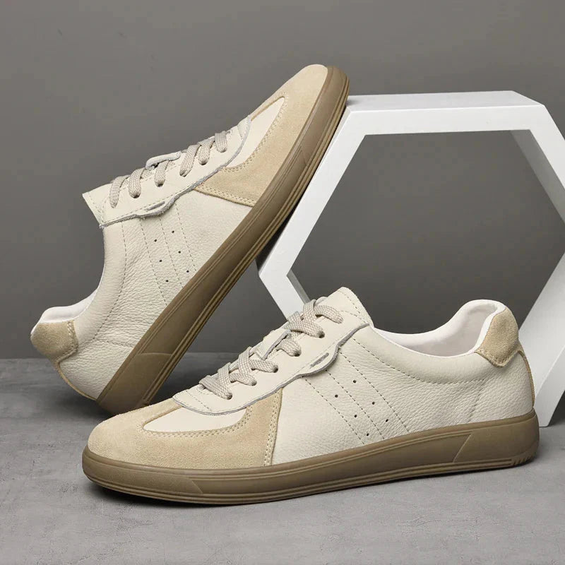Men's low-top leather sneakers mixed material upper lace-up closure modern casual silhouette
