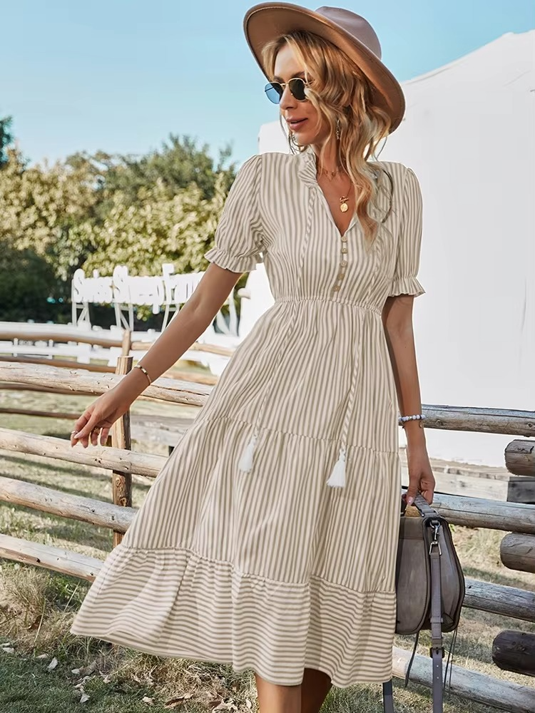 Striped V-neck midi dress with short sleeves and tassel details, breezy women's summer style