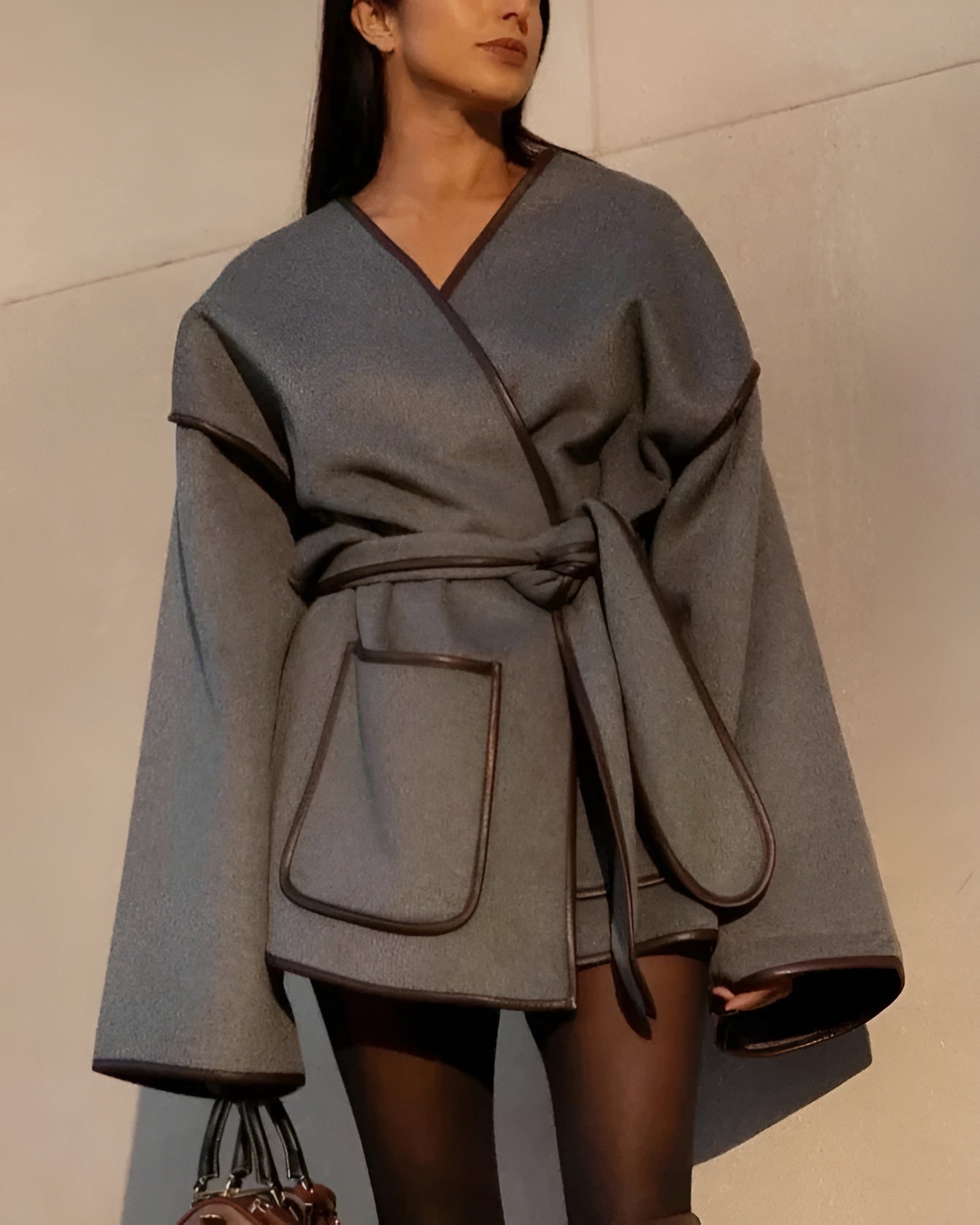 Women's oversized striped lace overcoat with drop shoulders and contrasting leather trim detail