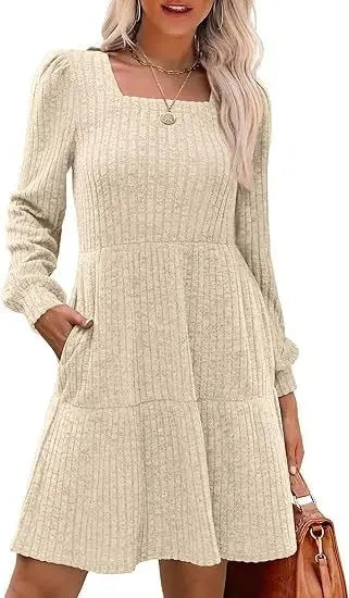 Elegant white mini dress with empire waist, square neckline, and doll pockets for women
