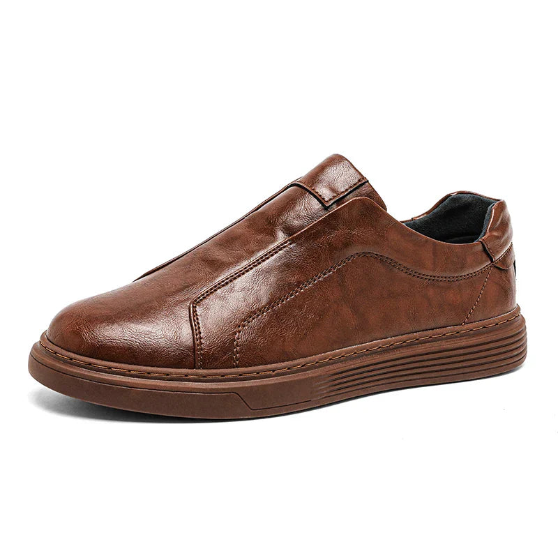 Men's black faux leather slip-on loafers standard fit with ribbed sole and stitched detailing