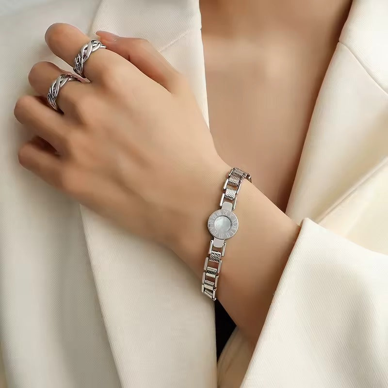 Roma Halo pearl face bracelet titanium plated chain Roman numeral accents gold-toned cubes tarnish resistant