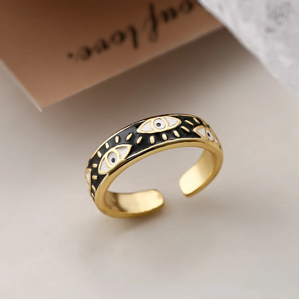 Adjustable stainless steel evil eye protection ring bold symbolic motif unisex statement band