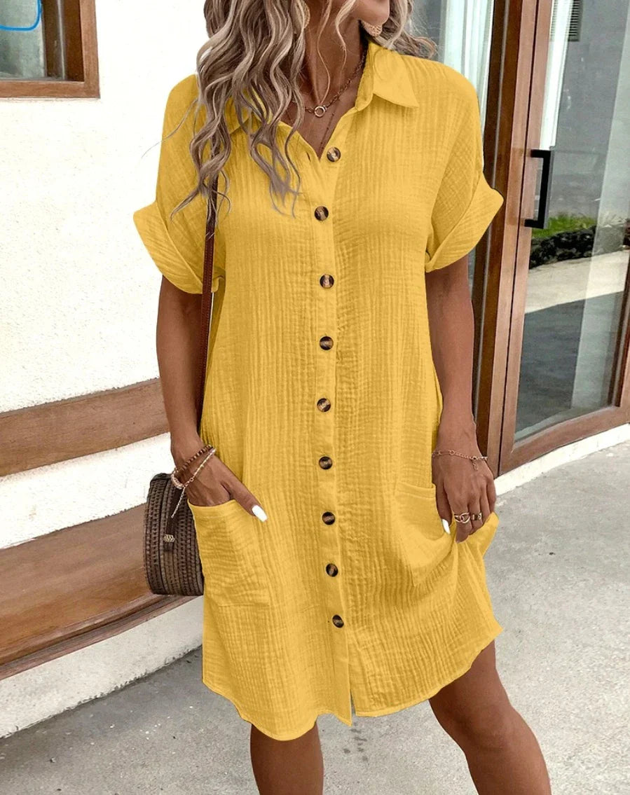 Women's white cotton-linen mini dress with flattering V-neckline and breezy relaxed fit