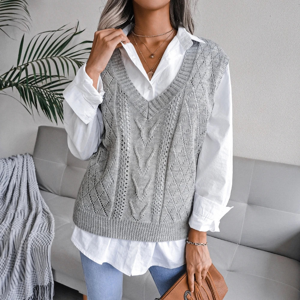Women's ivory cable-knit wool vest tailored silhouette with intricate textured pattern