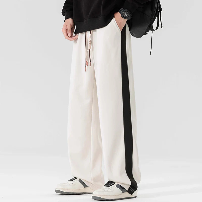 Gray relaxed straight-leg sweatpants with minimal stripe detail, midweight cotton blend for gym and lounge