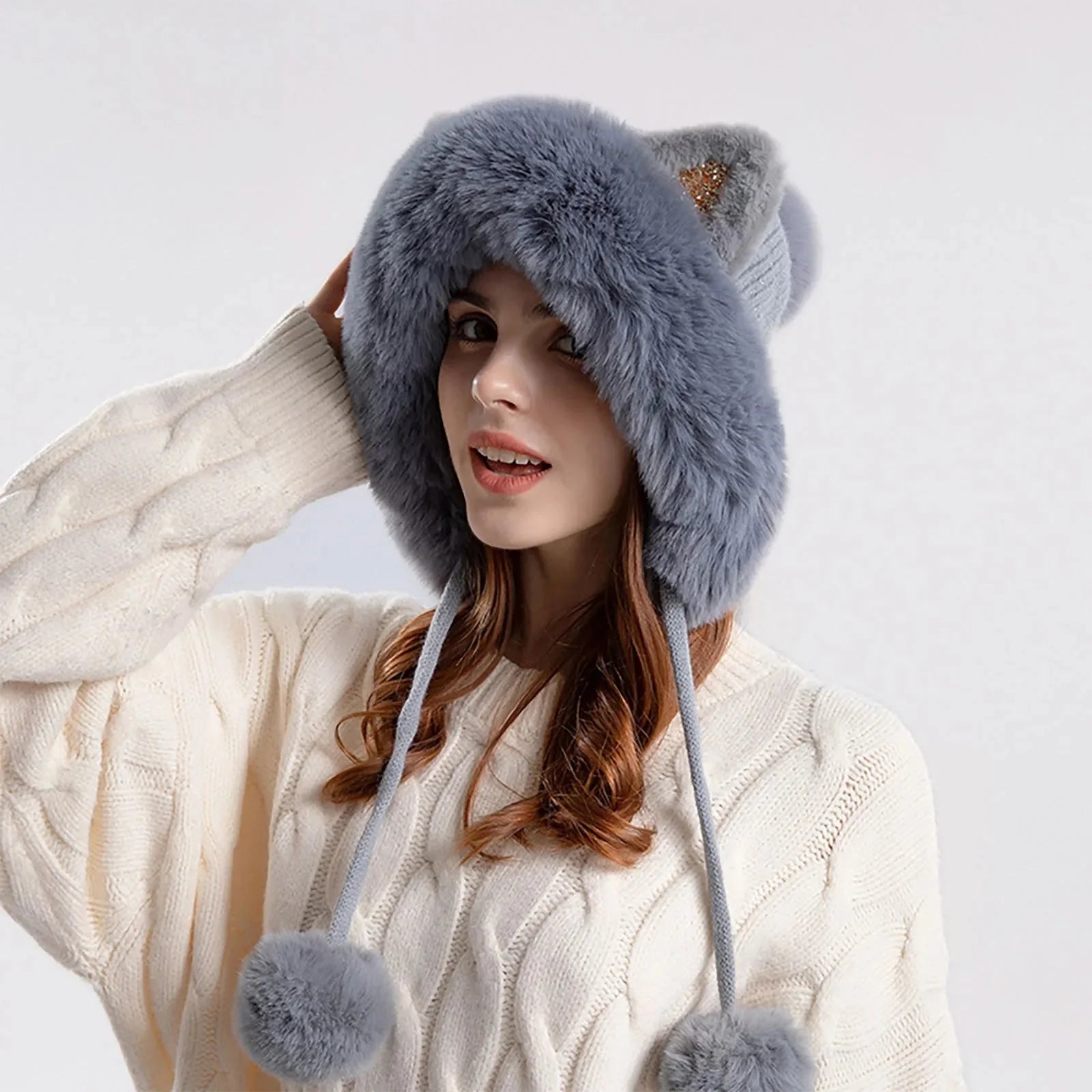 Women's gray cat ear trapper hat with pom pom and cozy ear flaps for winter warmth