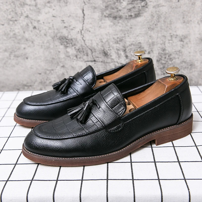 Men's brown leather tassel loafers slip-on style with croc-embossed toe and durable rubber sole