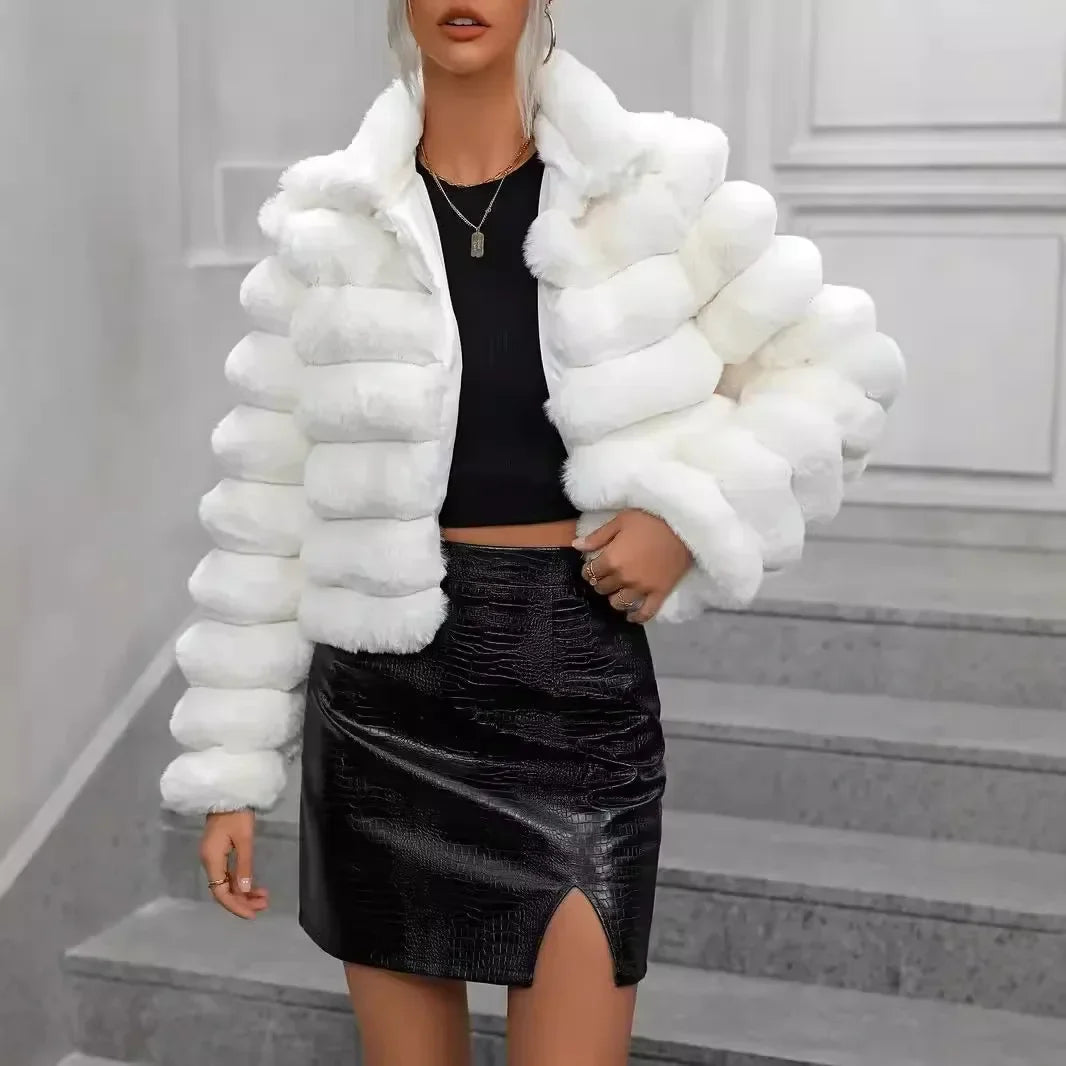 Women's short faux fur coat in plush polyester with chic silhouette and cozy winter warmth